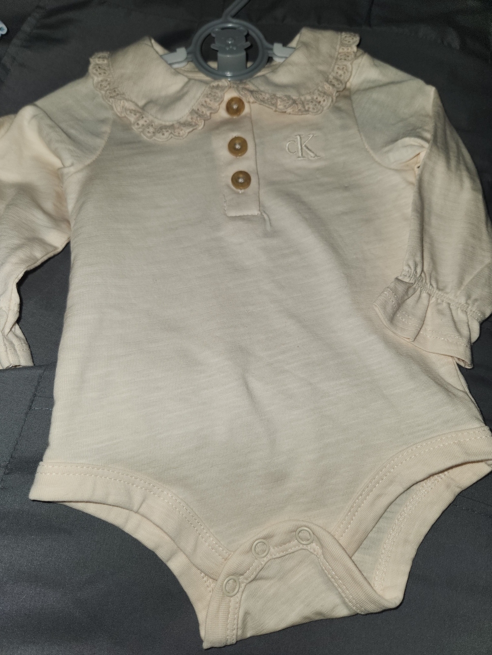 Calvin Klein Cream Baby Bodysuit with Gray Teether Ring - Picture 5 of 8